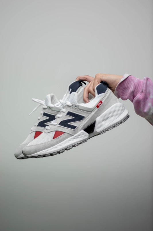New Balance sneaker held up